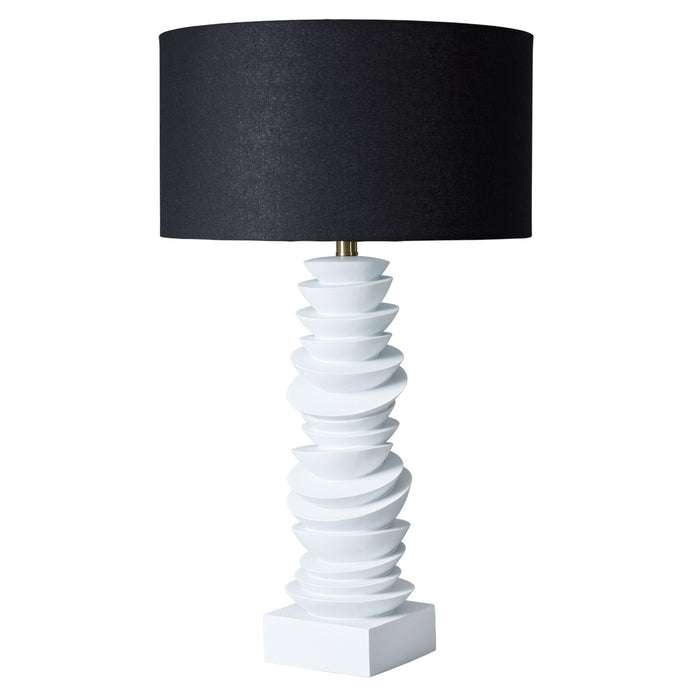 [Brand] table lamp with black shade and white base.