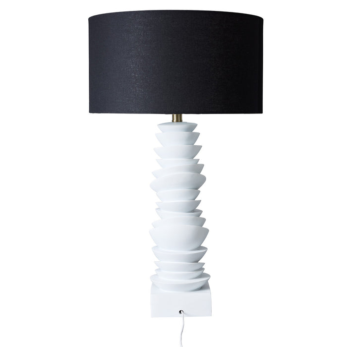 Sculptural white lamp with black shade by [Brand].