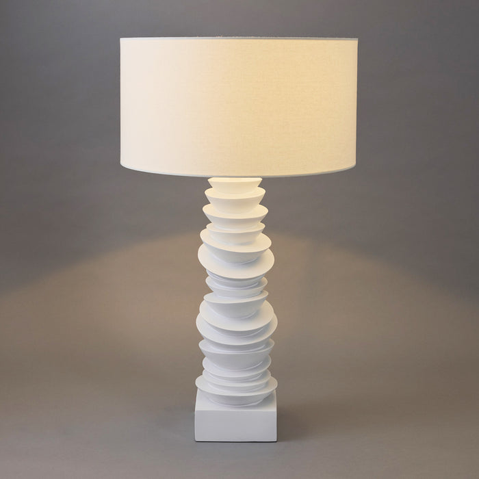 Modern table lamp with unique stacked design from [Brand].