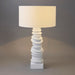 Modern table lamp with unique stacked design from [Brand].