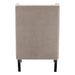 Modern beige armchair's back view with metal legs, [Brand].