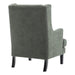 Gray upholstered chair by [Brand] with dark wooden legs.