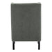 Rear view of [Brand] armchair; gray fabric, black legs.