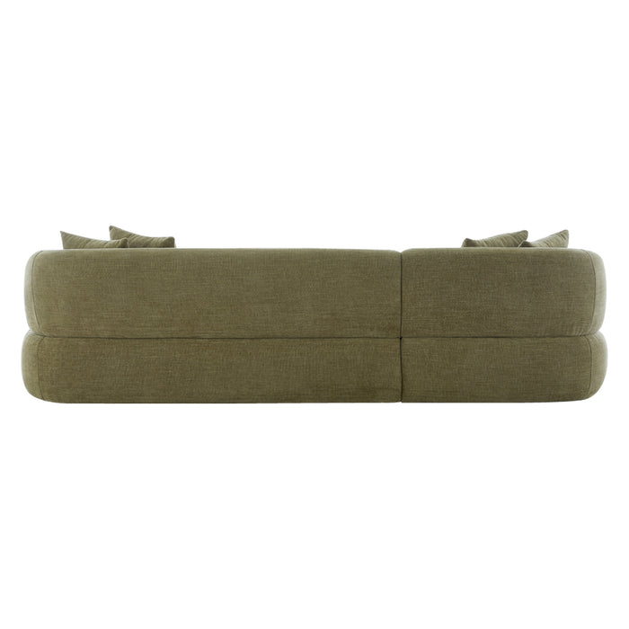 [Brand] olive green sofa with plush cushions, side view.