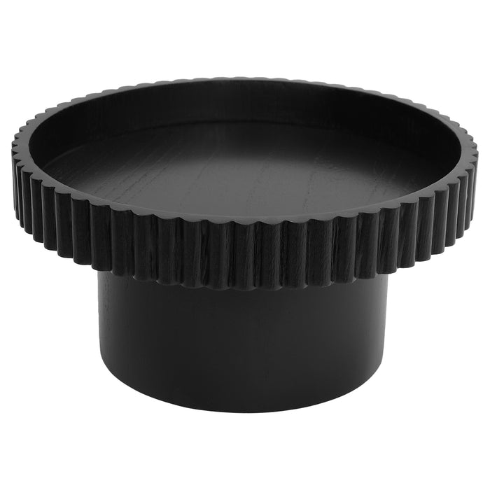 [Brand] black round coffee table with grooved top design.