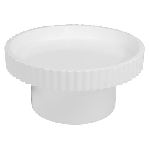 White, round table with ribbed edges from [Brand].