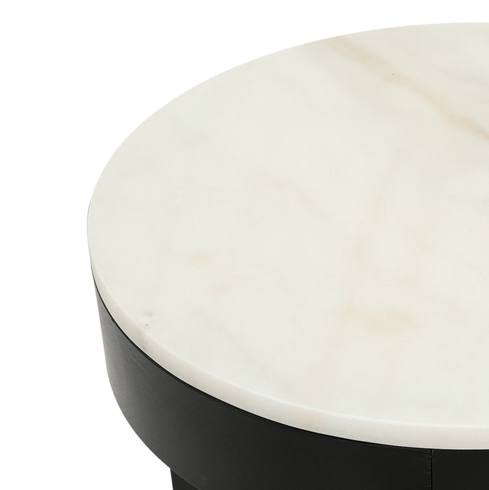 [Brand] table with a round marble top, black base.