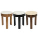 Three [Brand] stools with different finishes and marble tops.