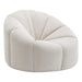 [Brand] beige plush armchair with a segmented, rounded design.