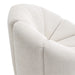 Cream upholstered armchair featuring textured fabric by [Brand].