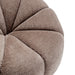 [Brand] beige cushioned furniture close-up with textured fabric detail.