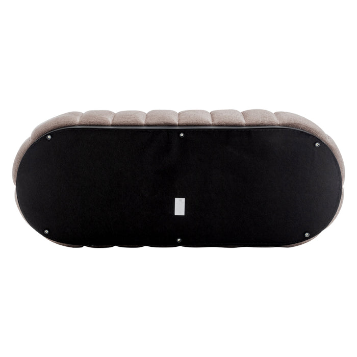 Bottom view of upholstered [Brand] ottoman with black base.