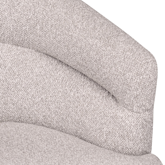 Soft, light grey fabric armrest from [Brand] sofa close-up.