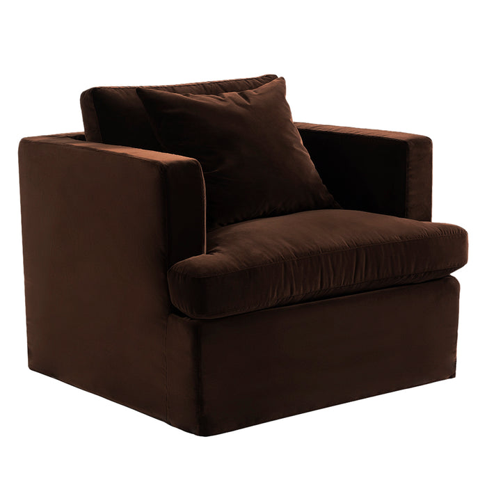 Dark brown velvet armchair with cushions from [Brand].