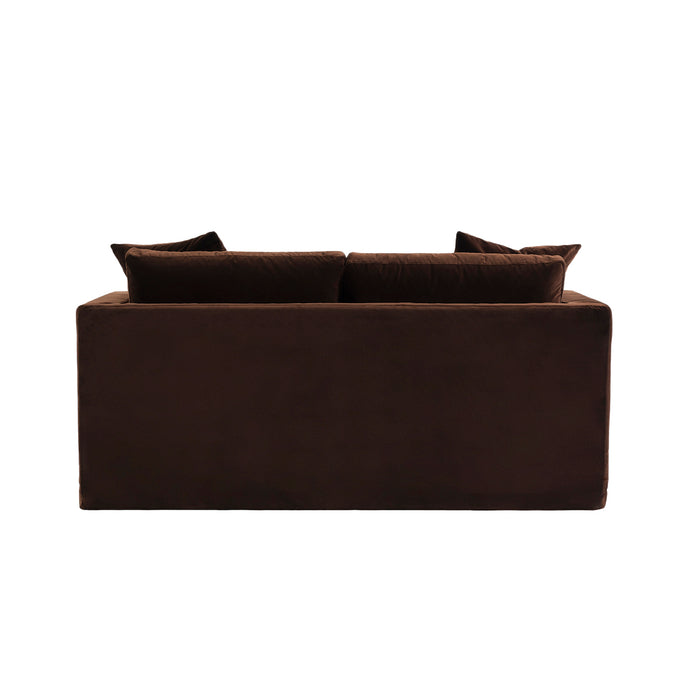 Brown sofa by [Brand], back view with plush cushions.