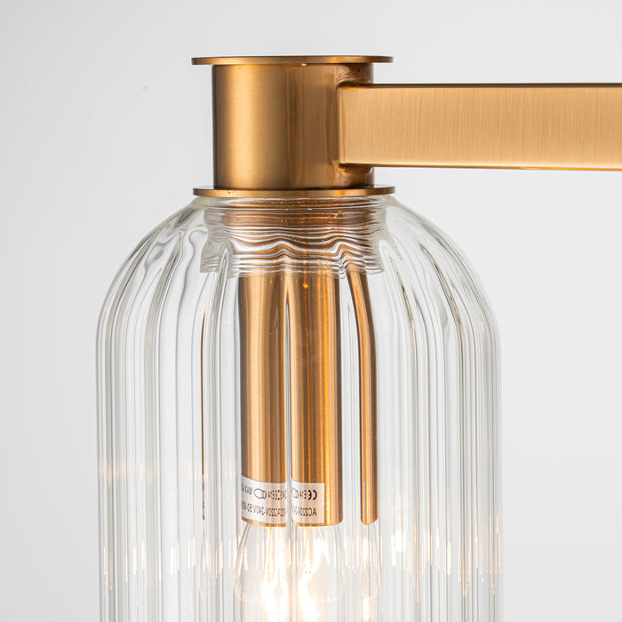 Gold and glass light fixture by [Brand], elegant design.
