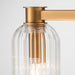 Gold and glass light fixture by [Brand], elegant design.