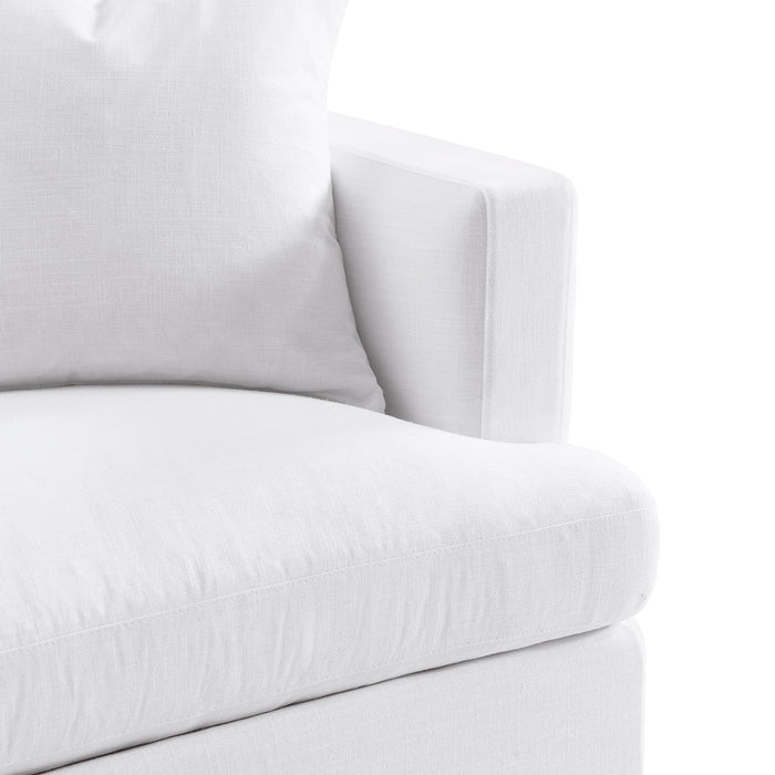 White upholstered corner sofa with cushion by [Brand], minimal design.