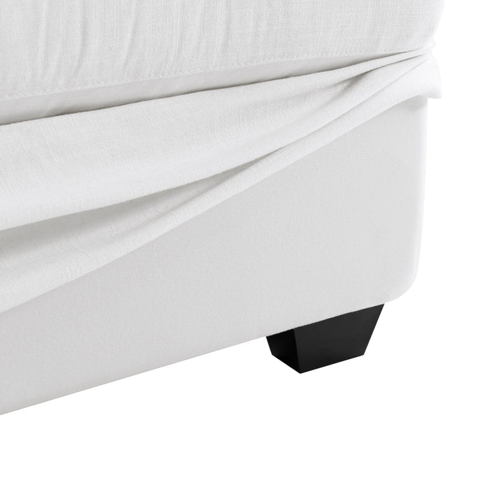 [Brand] white upholstered bed base with black wooden leg.