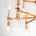 [Brand] chandelier with brass frame and clear glass shades.