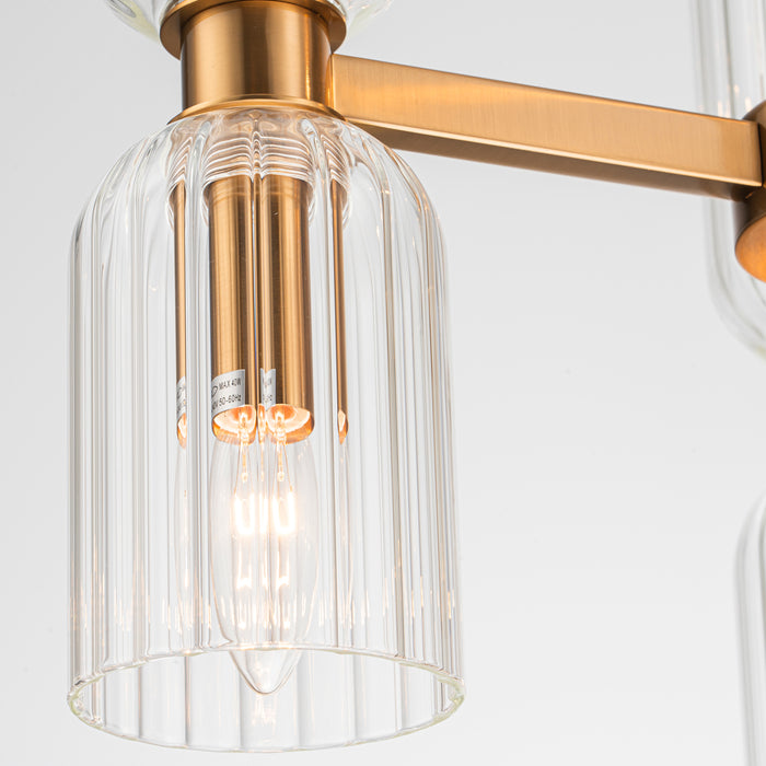 Modern [Brand] lamp with clear ribbed glass and brass.