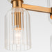 Modern [Brand] lamp with clear ribbed glass and brass.