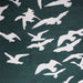 White bird silhouettes on dark green background, [Brand] design.