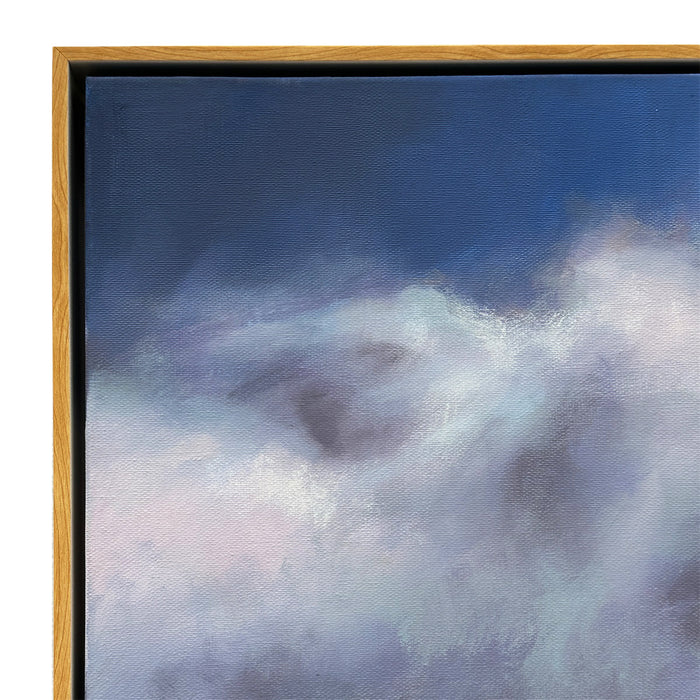 [Brand] framed artwork with swirling blue and white clouds.