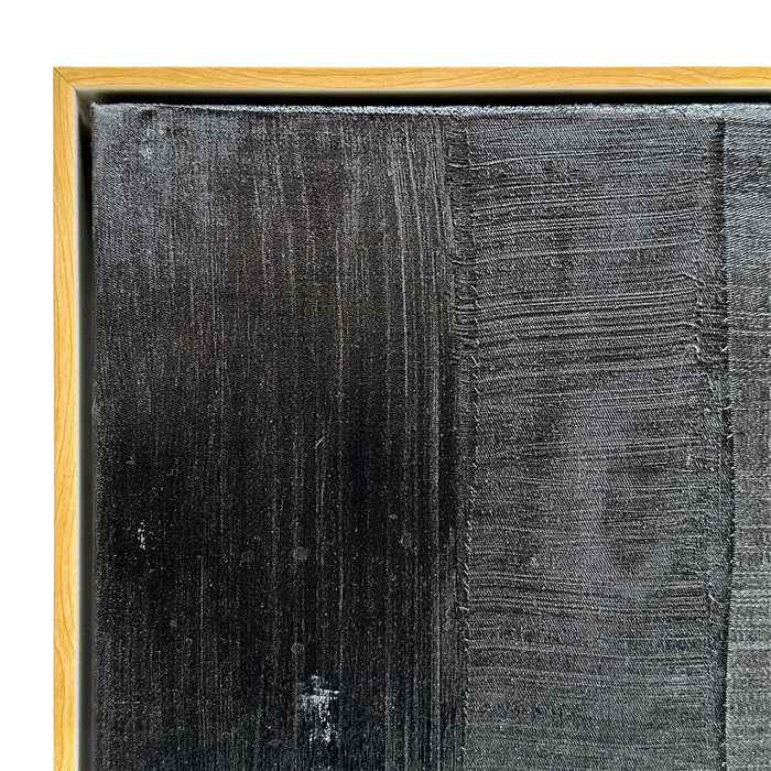 [Brand] black textured art in wooden frame, close-up.