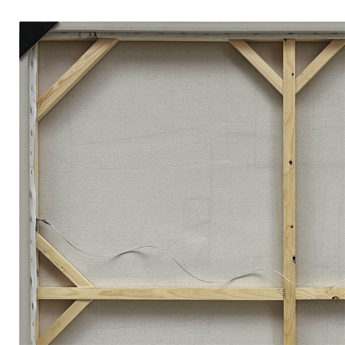 Back of a [Brand] canvas frame showing wooden stretcher bars.