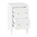 [Brand] white nightstand with ribbed drawers and gold knobs.