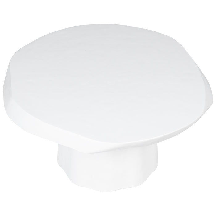 White abstract table from [Brand] with a rounded top.