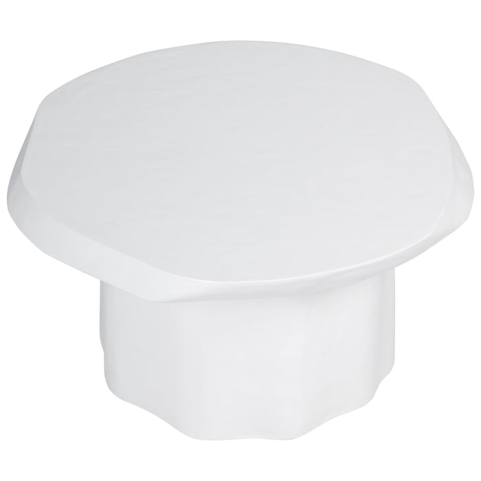 White [Brand] octagonal side table with a smooth finish.