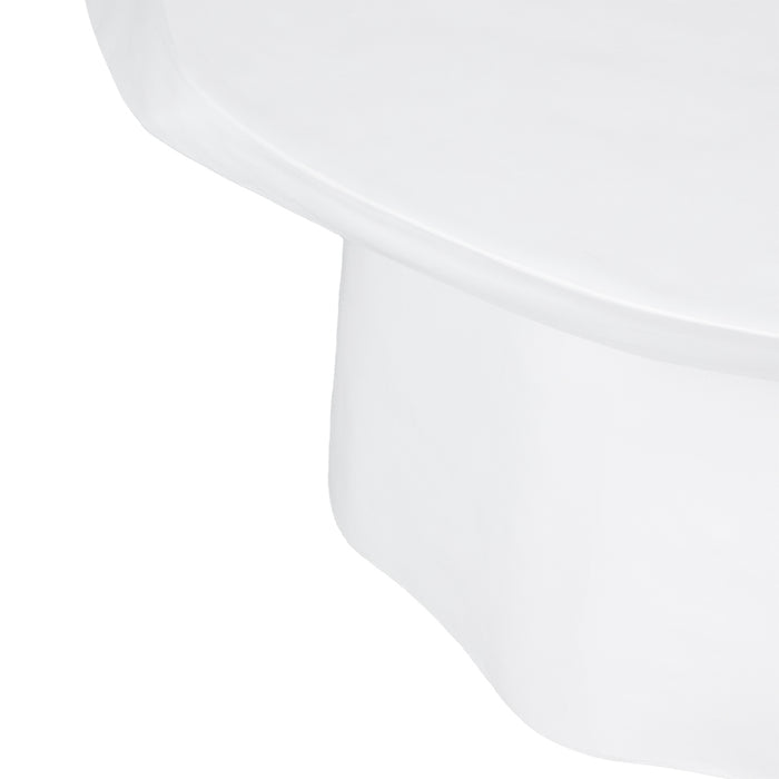 Close-up of white [Brand] ceramic sink showcasing smooth contours.