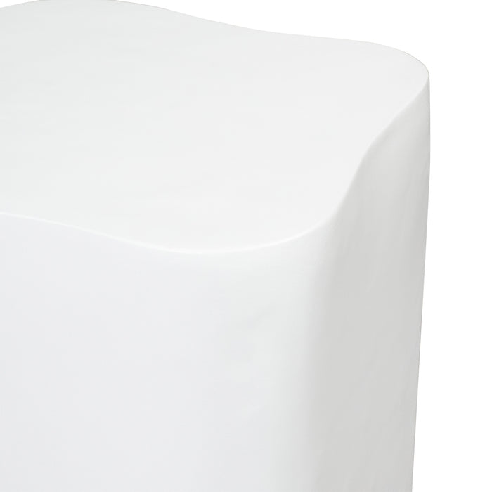 Smooth white curved stool by [Brand], minimalist modern design.