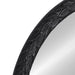 [Brand] mirror with black leaf-patterned decorative circular frame.