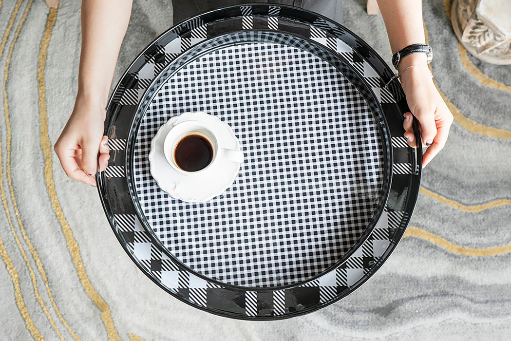 Set of 2 black and grey plaid motif round trays