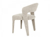 Modern beige boucle chair by [Brand], featuring curved design.