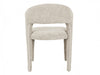 A plush chair with rounded back by [Brand], beige-colored.