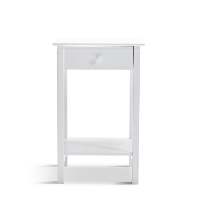 [Brand] white bedside table with drawer and lower shelf.