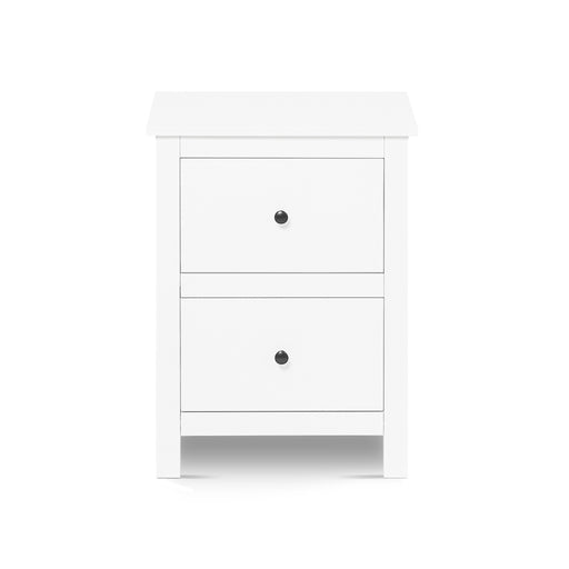 White [Brand] nightstand with two drawers and black handles.