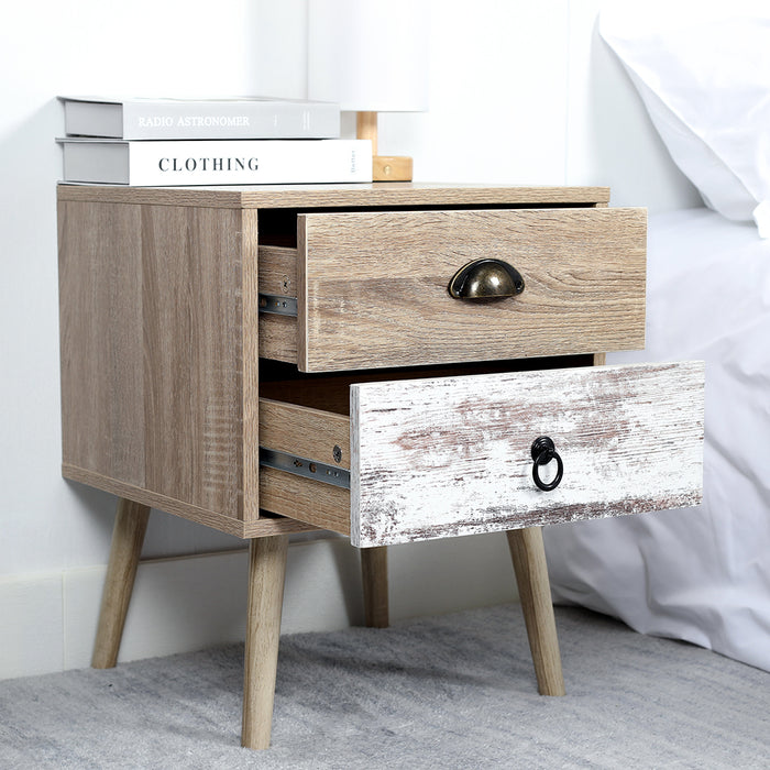 [Brand] wooden nightstand, two drawers open, books on top.
