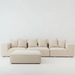 Cosmos Ottoman Oatmeal in modular sofa setting