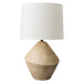 [Brand] lamp with textured beige base, white fabric shade.
