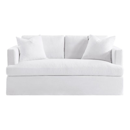 White [Brand] couch with three cushions, minimalist design.
