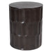 Dark cylindrical stool with textured surface, by [Brand].