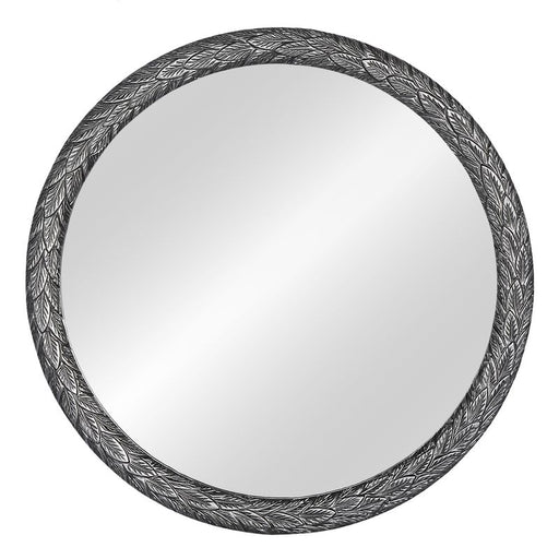 Round mirror with detailed leaf-patterned frame by [Brand].