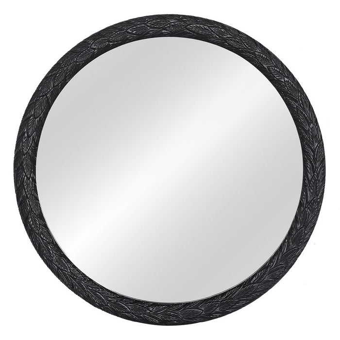 Round mirror with ornate black frame by [Brand].